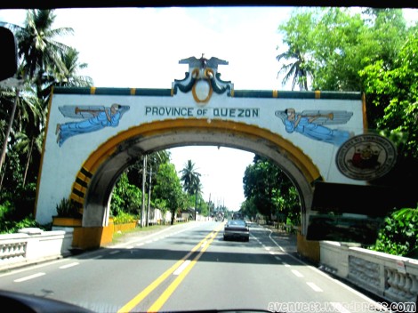 When you see the Quezon Province arch, turn left.